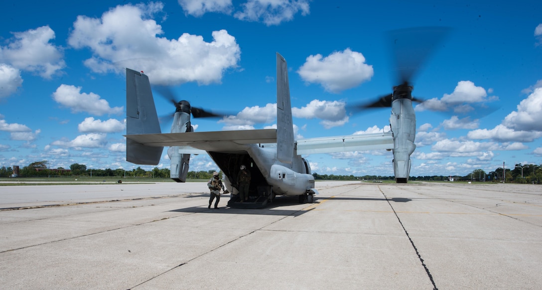 Marines prepare an MV-22 Osprey before a public flyover of Detroit as part of Marine Week, Sept. 6, 2017. Marine Week provides an opportunity for the Marine Corps to visit a city that normally doesn’t have opportunities to interact with Marines on a regular basis.