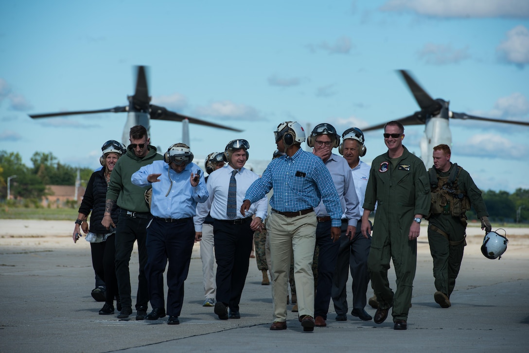 Local dignitaries from Detroit, enjoy their military experience during the MV-22 Osprey flights over Detroit as part of Marine Week, Sept. 6, 2017.
