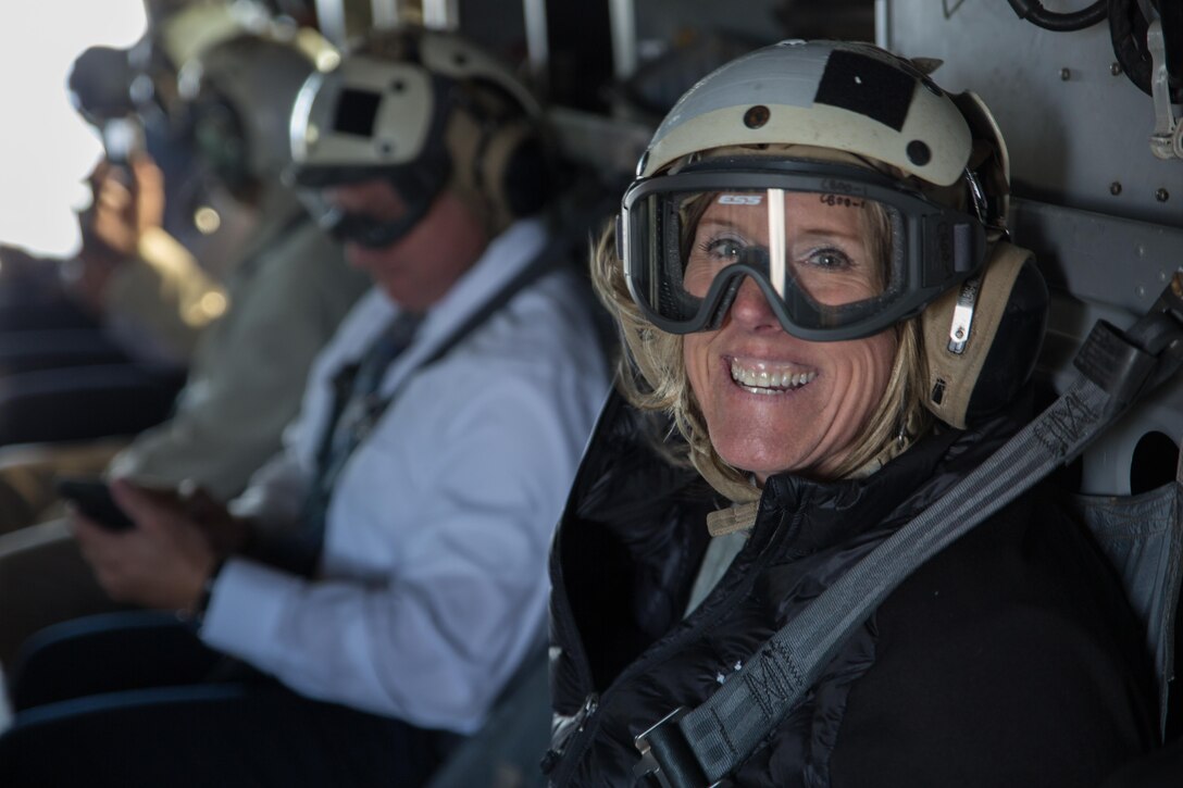 Local dignitaries from Detroit, enjoy their military experience during the MV-22 Osprey flights over Detroit as part of Marine Week, Sept. 6, 2017. More than 700 Marines are participating in Marine Week Detroit to give the citizens of the greater Detroit area the opportunity to meet their Marines and celebrate community, country and Corps.