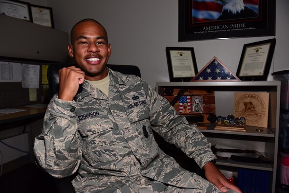 U.S. Air Force Staff Sgt. Bryan Robinson, the First Term Airmen Course (FTAC) NCO in charge, mentors Airmen during FTAC at Whiteman Air Force Base, Mo., Aug. 17, 2017. FTAC is a five-day class that consists of briefs from different base agencies, 13 hours of professionalism training and tours of a B-2 Spirit and the Oscar-1 Minuteman Missile Alert Facility. (U.S. Air Force photo/Staff Sgt. Danielle Quilla)