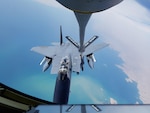 A Republic of Singapore Air Force aircraft refuels a Coalition aircraft above Southwest Asia. (Courtesy photo from Republic of Singapore Air Force)