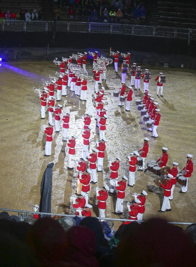 Marines with “The Commandant’s Own” U.S. Marine Drum & Bugle Corps perform their music in motion routine during the Avenches Tattoo in Avenches, Switzerland, Sept. 1, 2017. This was the 13th iteration of this tattoo since 1999, bringing approximately 500 military and civilian musicians from all over the world. (Official U.S. Marine Corps photo by Lance Cpl. Damon McLean/Released)