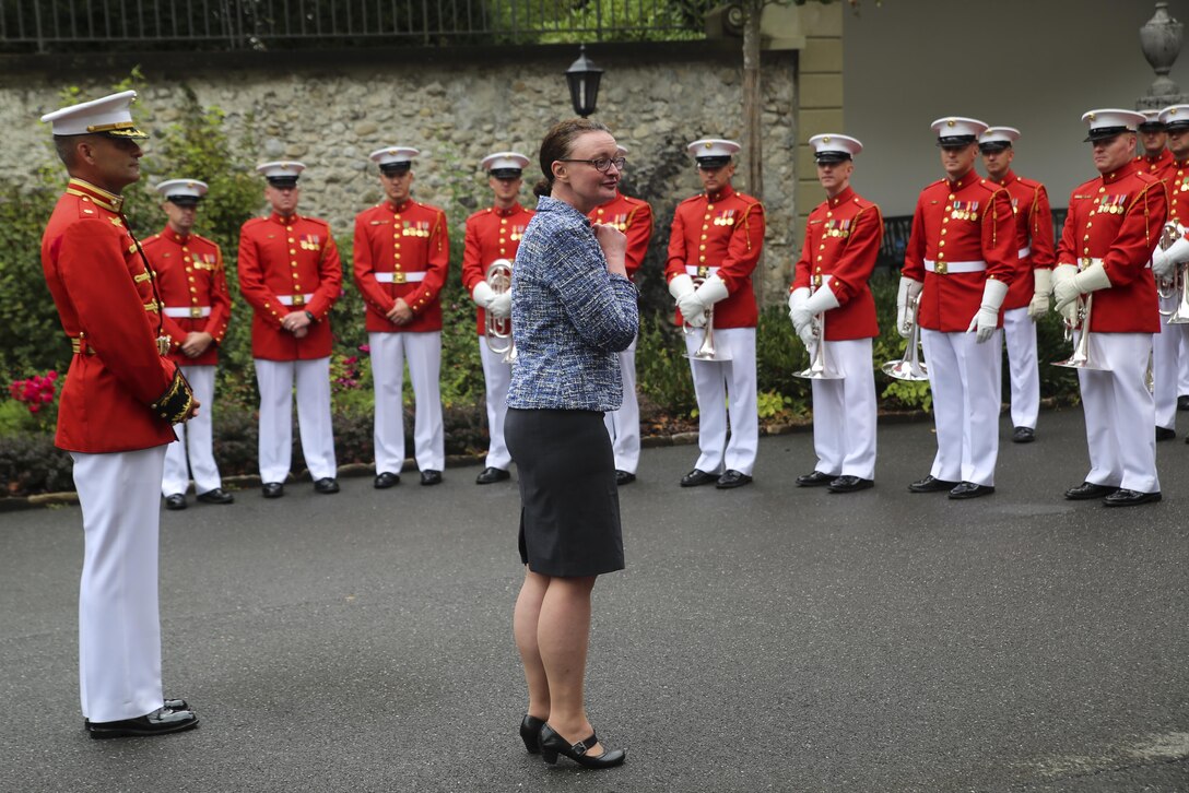 Tara Feret Erath, Charge d’Affaires, U.S. Embassy Bern, Switzerland, speaks to Marines with “The Commandant’s Own” U.S. Marine Drum & Bugle Corps after their performance for a Law Enforcement Reception at U.S. Embassy Bern, Switzerland, Sept. 1, 2017. The D&B performed a concert for high-ranking officials and their friends and families. (Official Marine Corps photo by Lance Cpl. Damon Mclean/Released)