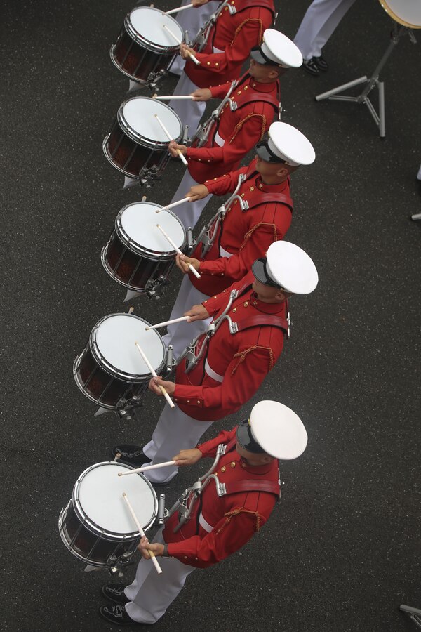 Marines with “The Commandant’s Own” U.S. Marine Drum & Bugle Corps perform a concert during the Law Enforcement Reception at the U.S. Embassy Bern, Switzerland, Sept. 1, 2017. The D&B performed a concert for high-ranking officials and their friends and families. (Official Marine Corps photo by Lance Cpl. Damon Mclean/Released)
