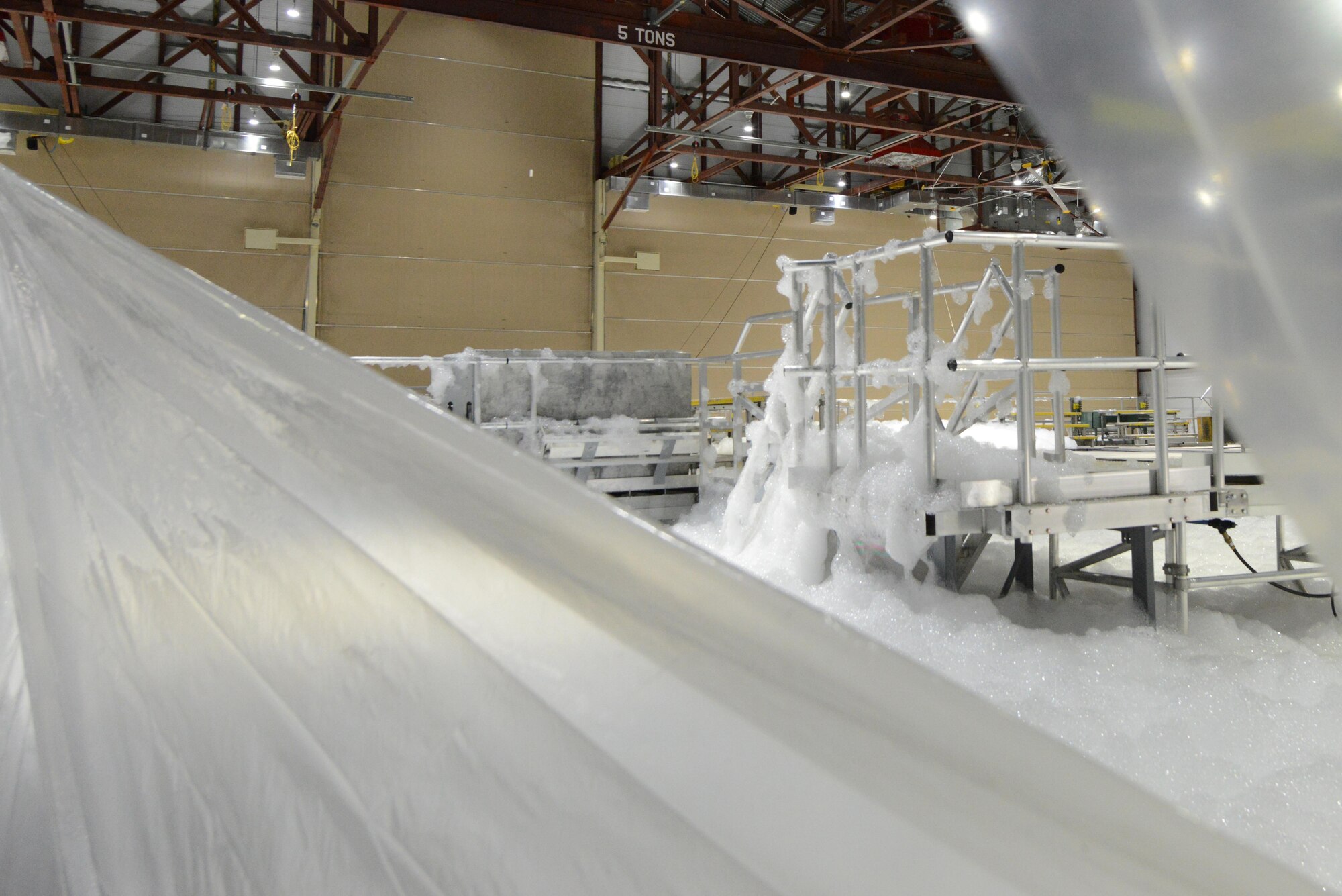 Contractors conducted the final high-expansion fire suppression foam test at Hangar 18 on Joint Base Elmendorf-Richardson, Alaska, Aug. 31, 2017. The foam test was conducted to ensure the new system performed as designed before it was released to the 176th Air National Guard.
