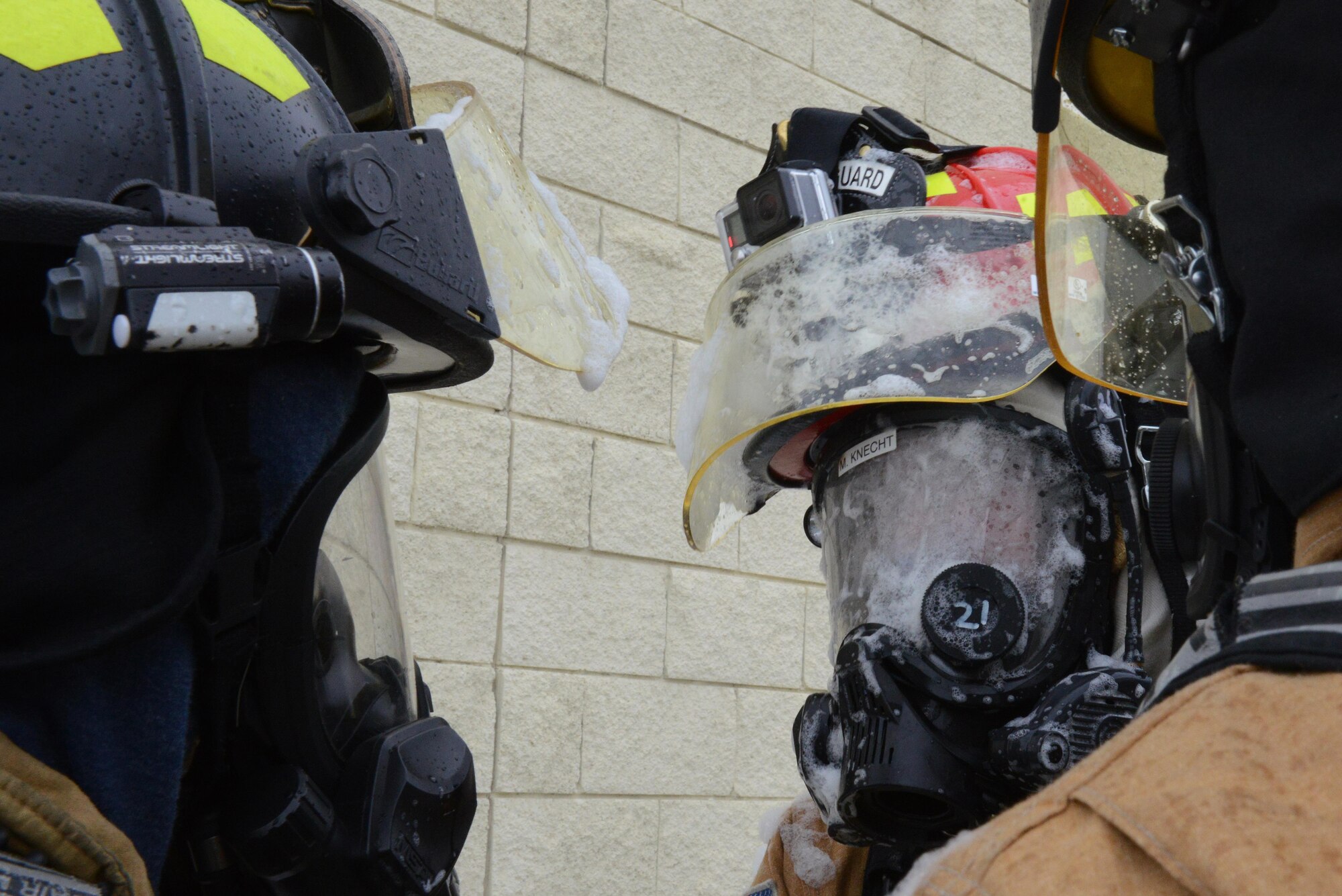 Firefighters assigned to the 673d Civil Engineer Squadron train during the high-expansion foam test at Hangar 18 on Joint Base Elmendorf-Richardson, Alaska, Aug. 31, 2017. The firefighters were a part of the foam test to practice and train for rescue operations.