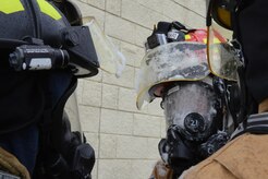 Firefighters assigned to the 673d Civil Engineer Squadron train during the foam test at Hangar 18 on Joint Base Elmendorf-Richardson, Alaska, Aug. 31, 2017. The firefighters were a part of the foam test to practice and train for rescue operations.