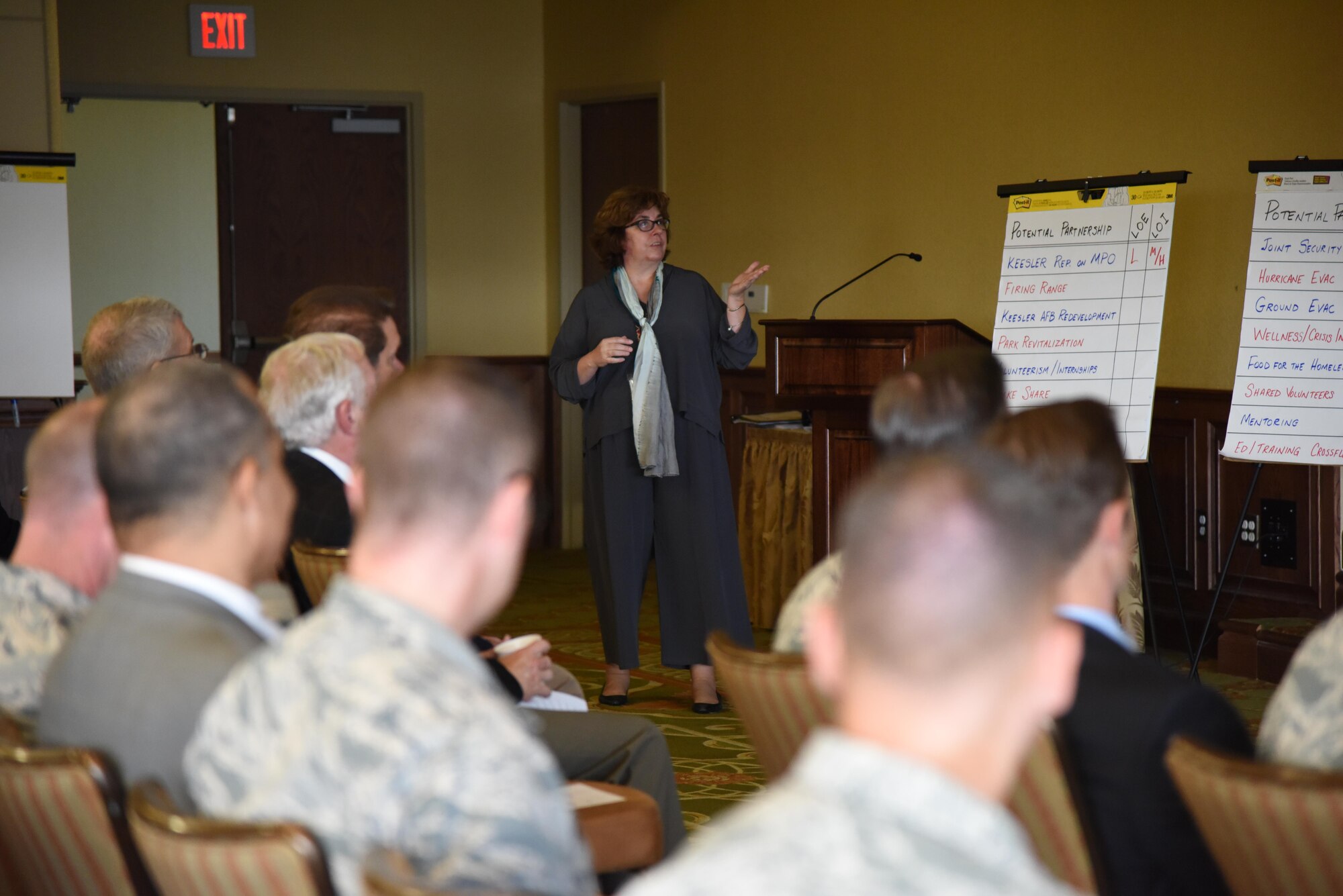 Susan Chamberlain, Base Operation Support community planner, shares her team’s ideas during the Air Force Community Partnership Program Priorities Workshop at the Bay Breeze Event Center Aug. 31, 2017, on Keesler Air Force Base, Mississippi. After members from Keesler and the local community developed creative ways to leverage capabilities, resources and reduce costs in their last meeting, they shared their ideas to achieve mutual value and benefit in support of the Air Force and its business partners. (U.S. Air Force photo by Kemberly Groue)
