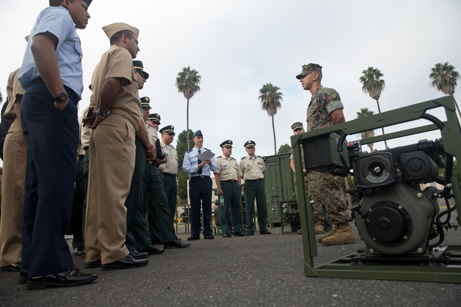 U.S. Marine Corps Lance Cpl. Erick Costa, a water support technician with Support Company, 7th Engineer Support Battalion, 1st Marine Logistics Group, explains the capabilities of the lightweight water purification system to the students from the Columbian War College’s General Staff Course at Camp Pendleton, Calif., Sept. 6, 2017. The Columbian War College established the General Staff Course as a requirement for promotion to the rank of lieutenant colonel for service members in the Colombian Army, Navy and Air Force.  (U.S. Marine Corps photo by Lance Cpl. Roderick Jacquote)
