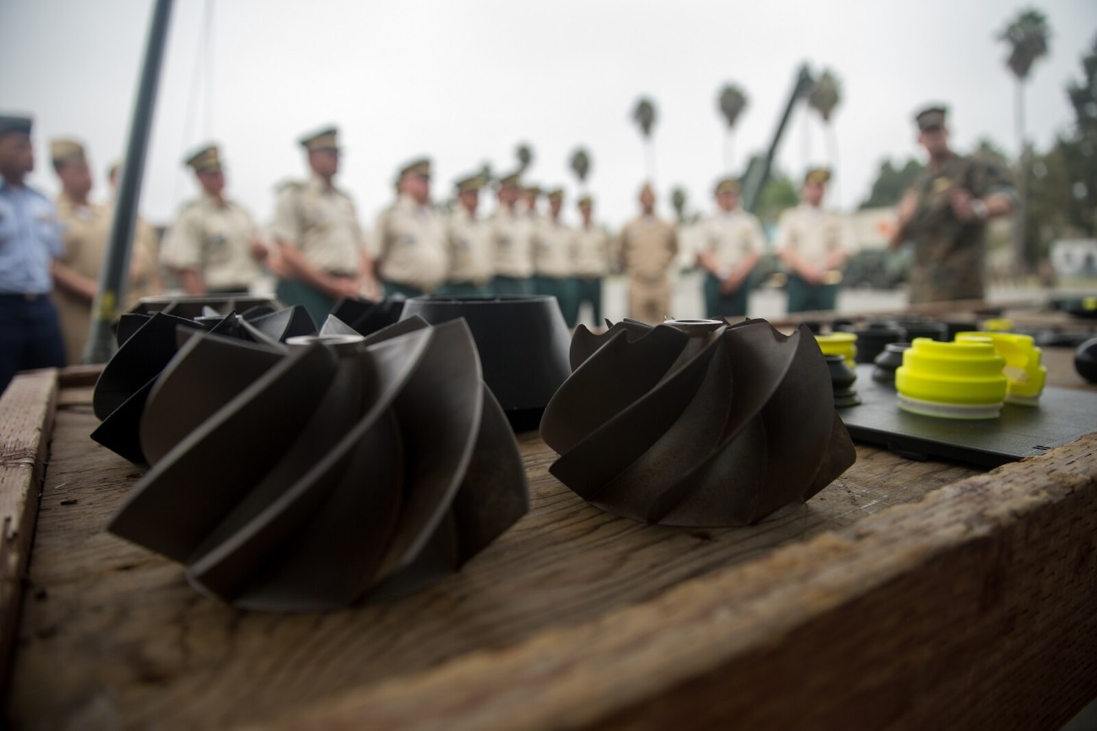 Scavenge fan blades are displayed during the visit from the students of Columbian War College’s General Staff Course at Camp Pendleton, Calif., Sept. 6, 2017. The Columbian War College established the General Staff Course as a requirement for promotion to the rank of lieutenant colonel for service members in the Colombian Army, Navy and Air Force. (U.S. Marine Corps photo by Lance Cpl. Roderick Jacquote)