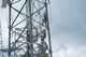 Airman 1st Class Blake Gordon, 49th Operations Support Squadron Airfield systems technician, and Staff Sgt. Philip Thach, 49th Communications Squadron noncommissioned officer in charge of radio frequency transmissions systems, climb to the top of Holloman Air Force Base's radar approach control at Buck Mountain, N.M., Aug. 29, 2017. These Airmen are members of the 49th Operations Support Squadron’s Communications Air Traffic Control and Landing Systems Maintenance Operations Center that work on optimizing the RAPCON. (U.S. Air Force photo by Airman 1st Class Ilyana A. Escalona)