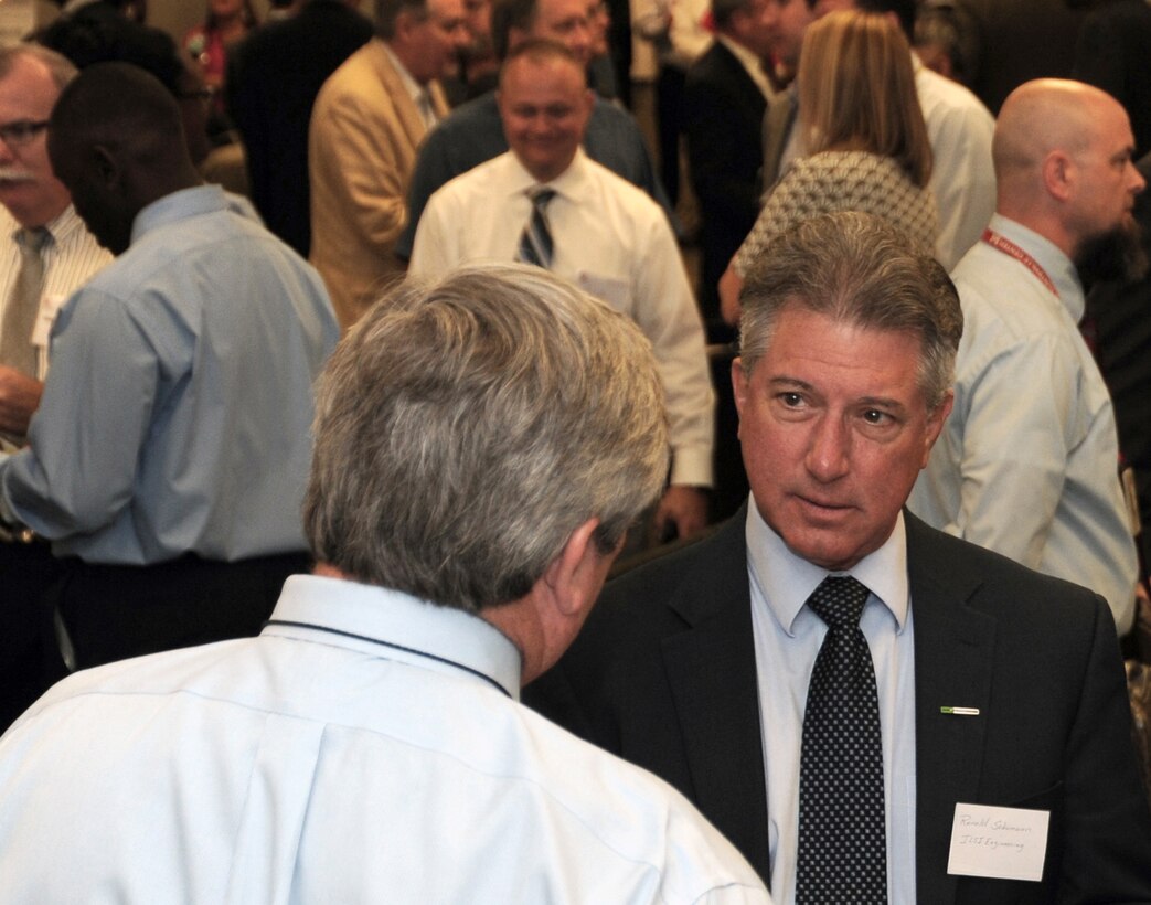 Small business representatives speak with subject matter experts at the Small Business Forum in 2016.