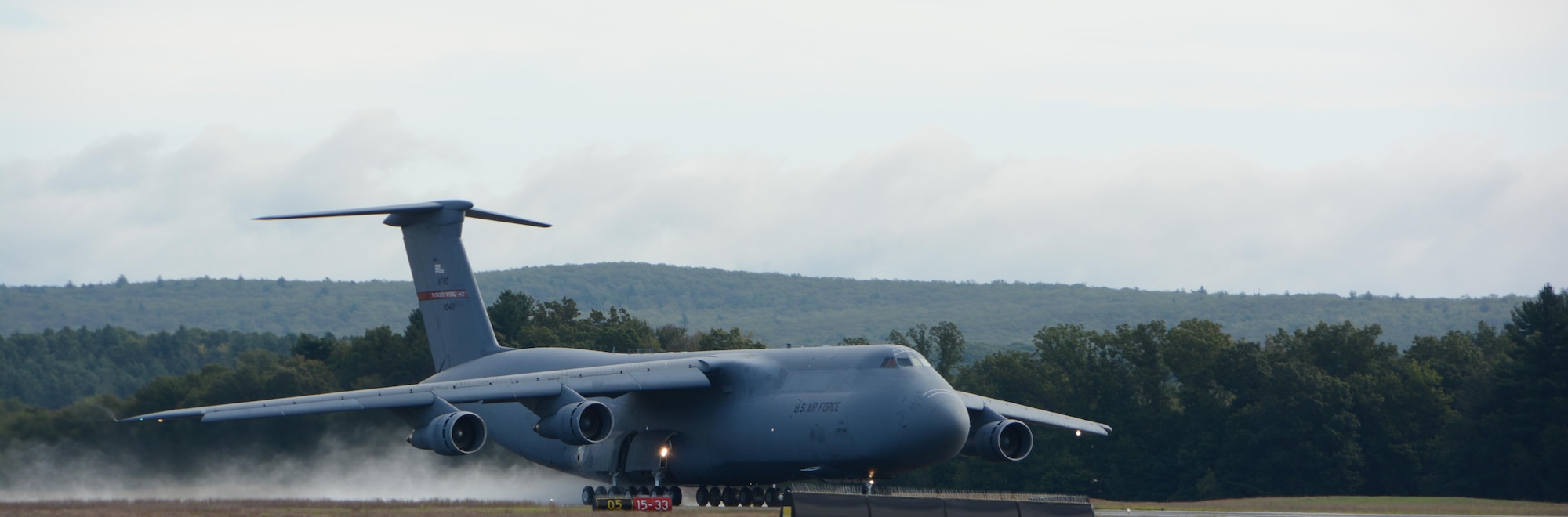 C-5A Galaxy 70-0461 departs from the runway September 7, 2017, at Westover Air Reserve Base, Mass. 0461 is the last C-5A in the Air Force and is destined for the boneyard at Davis-Monthan Air Force Base, Ariz. where it is set to retire. (U.S. Air Force photo by Airman Hanna N. Smith)