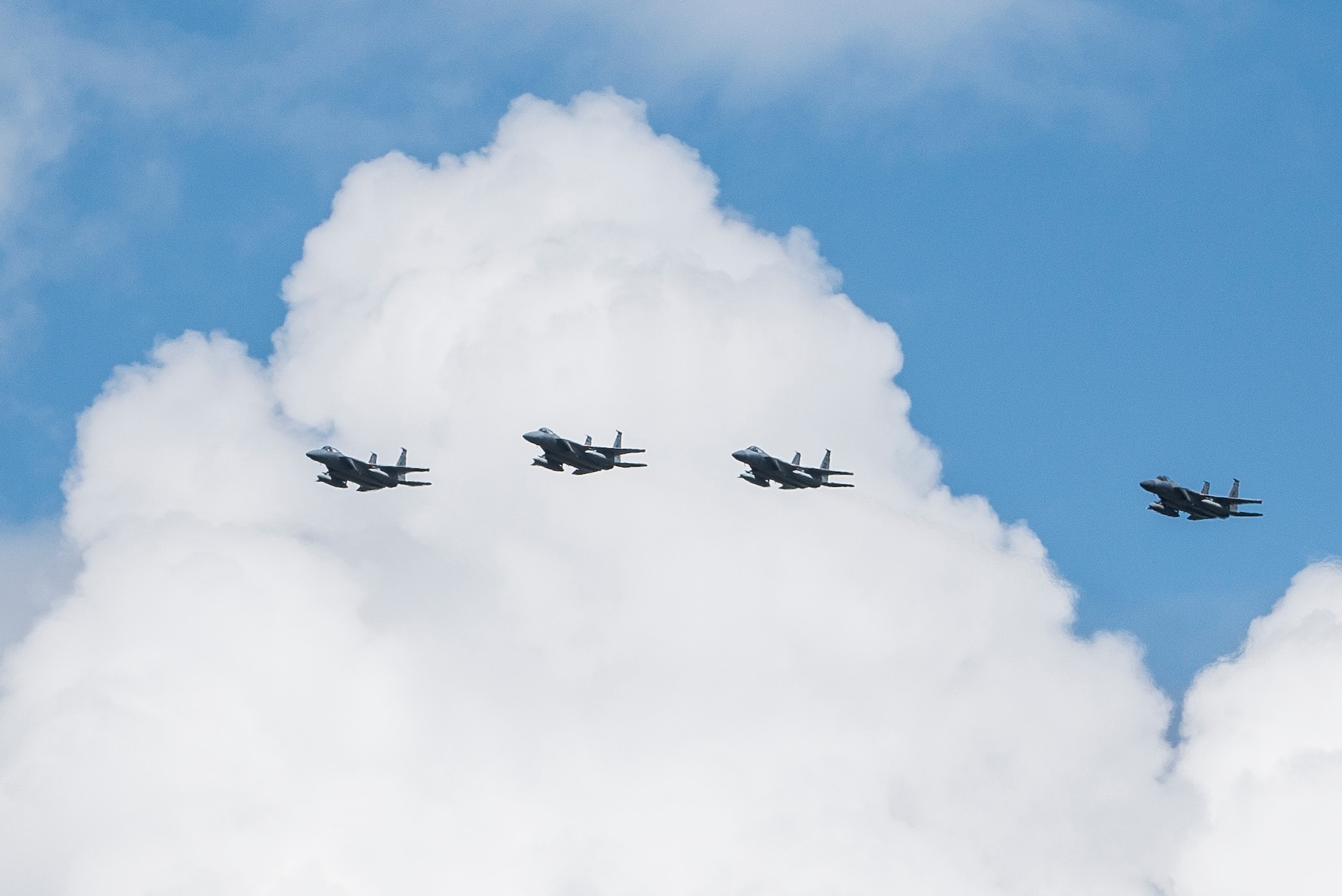 Four F-15C aircraft from the 125th Fighter Wing in Jacksonville, Fla., circle the runway of Wright-Patterson Air Force Base, Ohio, in preparation for landing and safe haven support, Sept. 7, 2017. The F-15 was one of several planes using Wright-Patterson AFB as a Safe Haven while Hurricane Irma threatens their home station. (U.S. Air Force photo by Wesley Farnsworth)