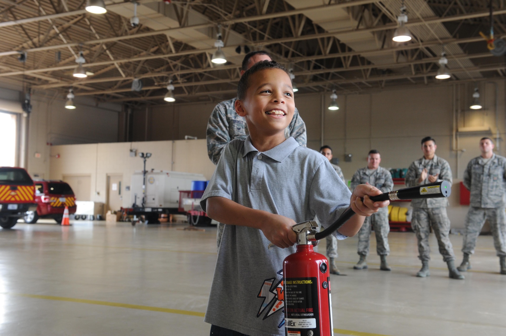 Young Hurlburt hero named honorary firefighter