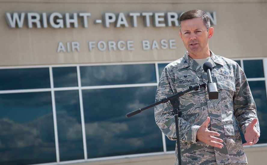 Installation commander and 88th Air Base Wing Commander Col. Bradley McDonald briefs the media on plans to receive Air Force aircraft evacuating from areas being affected by Hurricane Irma. (U.S. Air Force photo/Jim Varhegyi)