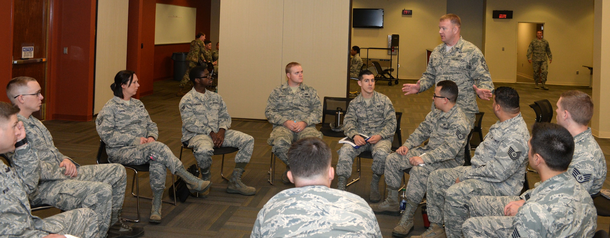 Chief Master Sgt. Adam Vizi, the 28th Bomb Wing command chief, speaks to a group of noncommissioned officers participating in Backbone University Sept. 6, 2017, on Ellsworth Air Force Base, S.D. Vizi brought the course to Ellsworth from his previous duty station in South Korea, valuable to NCOs on the base. (U.S. Air Force photo by Airman 1st Class Thomas Karol)