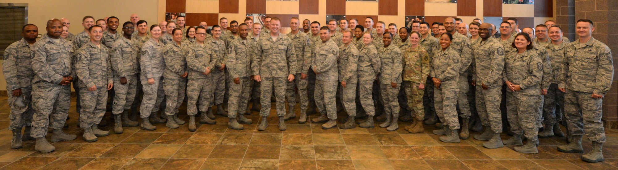 The entire graduating class and facilitators from Backbone University, a course focused on joint leadership development, pose for a group photo Sept. 5, 2017, on Ellsworth Air Force Base, S.D. Forty-five students graduated from the class and learned more about Joint operations, cooperation with other Department of Defense affiliates, and important issues presented to the Air Force noncommissioned officers, who make up the backbone of the of the enlisted corps. (U.S. Air Force photo by Airman 1st Class Thomas Karol)