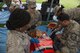 U.S. Air Force emergency medical team treat a simulated disaster victim during the Big Rescue Kanagawa Disaster Prevention Drill, Sept. 1, 2017, at Odawara City, Japan. The scenario for the event this year was a 7.3 magnitude earthquake occurred directly underneath the Kanto region. (U.S. Air Force photo by Airman 1st Class Donald Hudson)