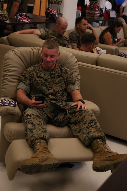 CAMP FOSTER, OKINAWA, Japan – Lance Cpl. Nicholas Mosley relaxes at the grand reopening Aug. 30 at the Camp Foster USO, Okinawa, Japan.