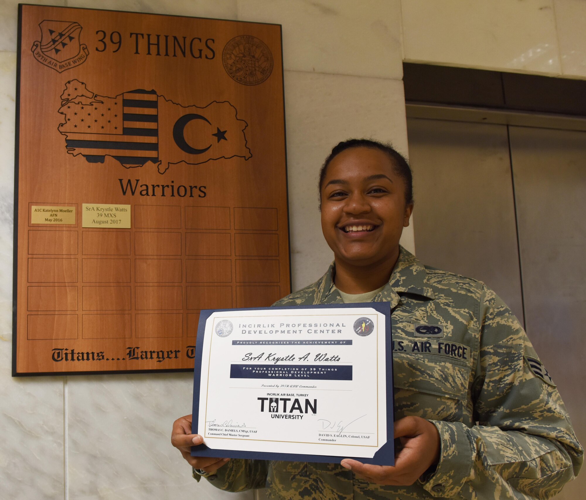 Senior Airman Krystal Watts earns the Titan University highest level of achievement.