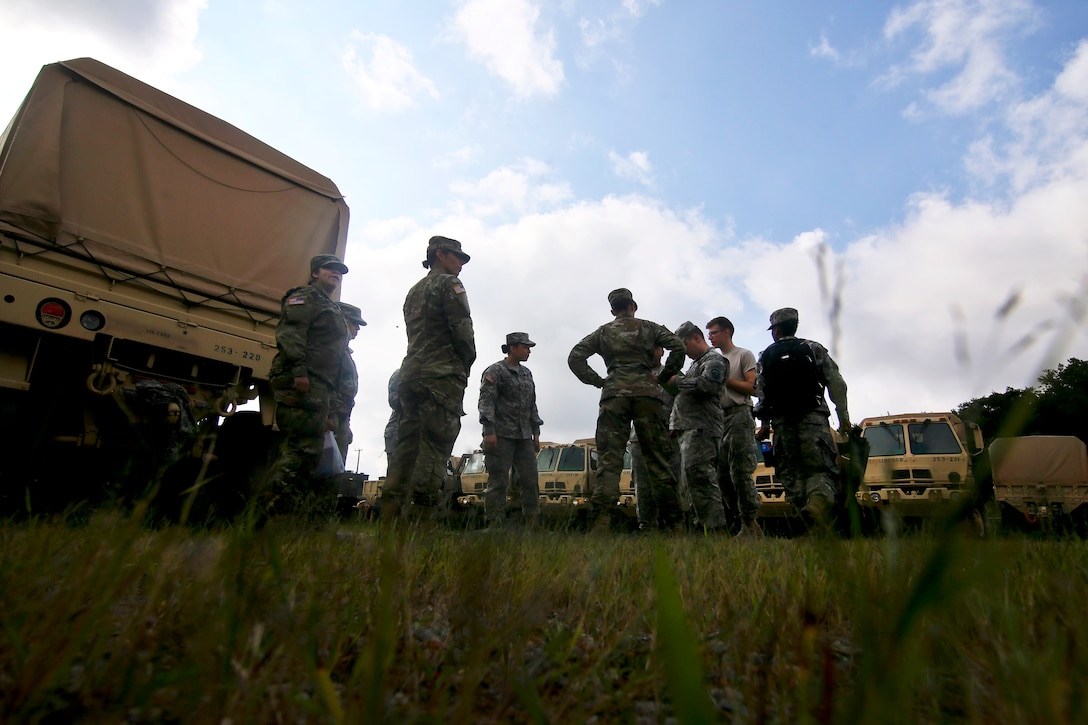 Army National Guardsmen receive a mission briefing.