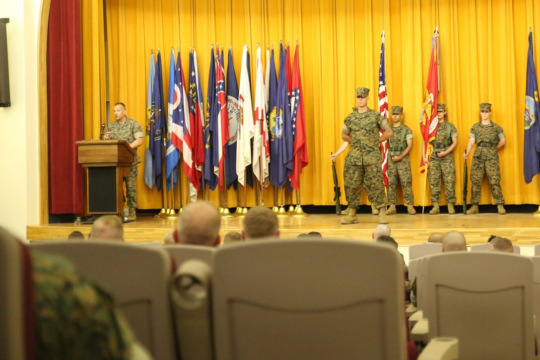 Col. Brian M. Howlett (left), commanding officer, III Marine Expeditionary Force Information Group, addresses the audience during the III MIG re-designation ceremony on Camp Courtney, Okinawa, Japan Sept. 8, 2017. III MEF Headquarters Group was re-designated in a ceremony as III MIG, highlighting the beginning of a new era of modern Marine Corps information warfare. (U.S. Marine Corps photo by Sgt. Tiffany Edwards)