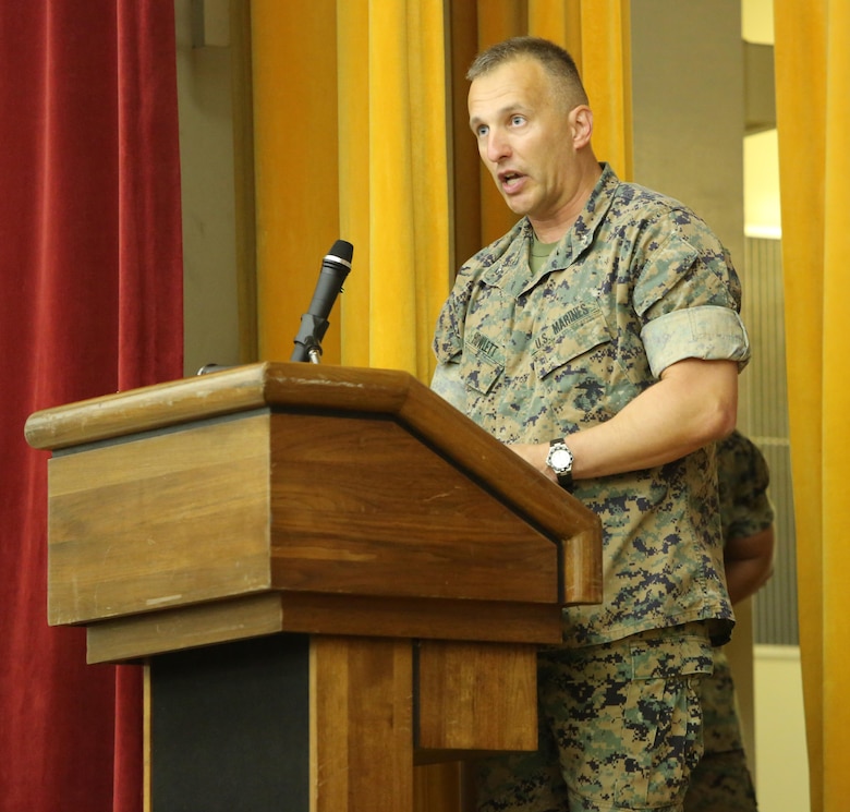 Col. Brian M. Howlett, commanding officer, III Marine Expeditionary Force Information Group addresses the crowed during the III Marine Headquarters Group re-designation ceremony at Camp Courtney, Okinawa, Japan on Sept. 8, 2017.