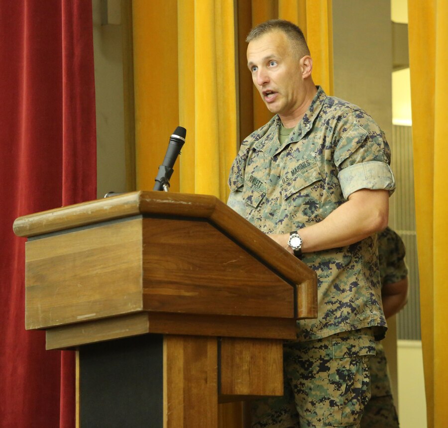 Col. Brian M. Howlett, commanding officer, III Marine Expeditionary Force Information Group addresses the crowed during the III Marine Headquarters Group re-designation ceremony at Camp Courtney, Okinawa, Japan on Sept. 8, 2017. III MHG was re-designated in a ceremony as III MEF Information Group, highlighting the beginning of a new era of modern Marine Corps information warfare. (U.S. Marine Corps photo by Lance Cpl. Christian J. Lopez)