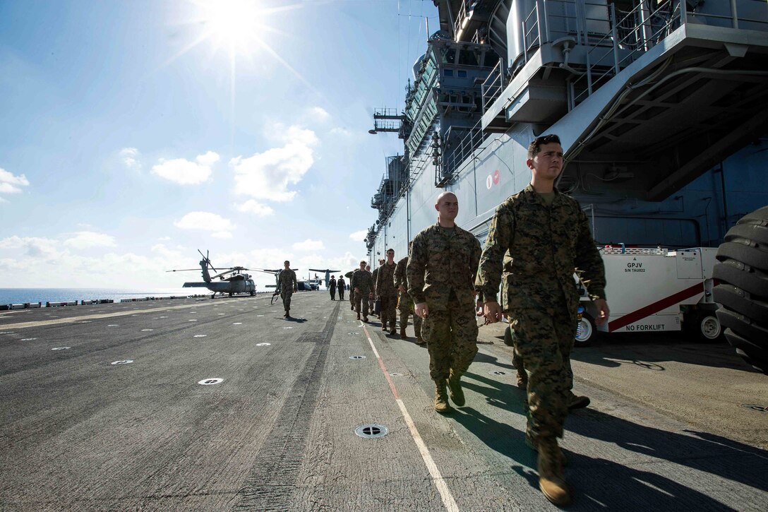 U.S. Marines with Battalion Landing Team 2nd Battalion, 6th Marine Regiment, 26th Marine Expeditionary Unit (MEU), conduct preliminary boarding procedures on a CH-53E Super Stallion helicopter and MV-22B Osprey aircraft with Marine Medium Tiltrotor Squadron 162 (Reinforced), 26th MEU, aboard the amphibious assault ship USS Kearsarge (LHD 3) in the Atlantic Ocean, Sept. 7, 2017. The preparations ensure the 26th MEU is ready to respond to any requests to bolster Northern Command's support of FEMA's assistance to federal, state and local authorities' ongoing relief efforts in the aftermath of Hurricane Irma. (U.S. Marine Corps photo by Lance Cpl. Tojyea G. Matally)