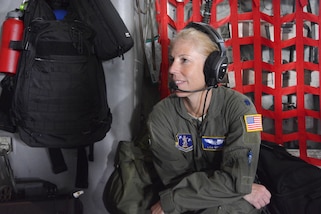 North Carolina Air National Guard Lt. Col. Lisa Reeves waits aboard a C-130 Hercules aircraft at the North Carolina Air National Guard Base, in Charlotte, N.C.