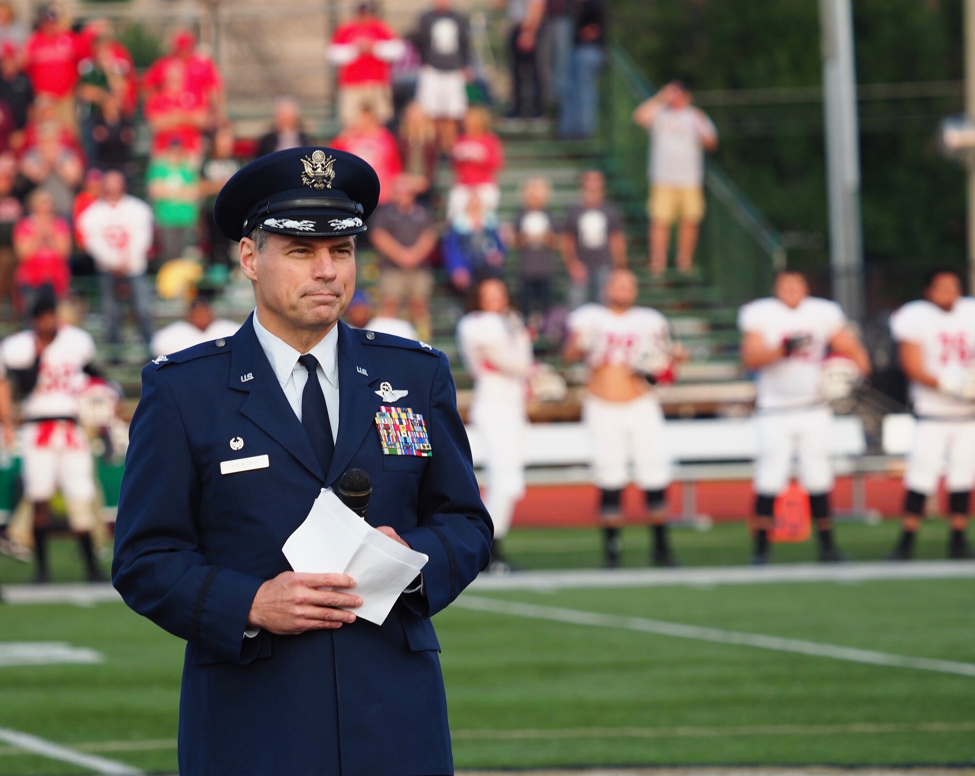 Col. Tony Polashek, 934th Airlift Wing commander, provides opening remarks at Concordia College's Night of Heroes event before the opening kickoff of their 2017 football season. (Air Force Photo/Paul Zadach)