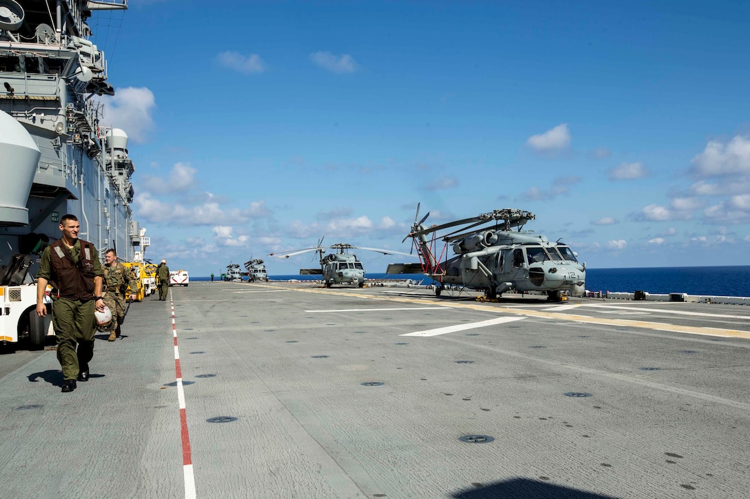 U.S. Marines with Battalion Landing Team 2nd Battalion, 6th Marine Regiment, 26th Marine Expeditionary Unit (MEU), conduct preliminary boarding procedures on a CH-53E Super Stallion helicopter and MV-22B Osprey aircraft with Marine Medium Tiltrotor Squadron 162 (Reinforced), 26th MEU, aboard the amphibious assault ship USS Kearsarge (LHD 3) in the Atlantic Ocean, Sept. 7, 2017. The preparations ensure the 26th MEU is ready to respond to any requests to bolster Northern Command's support of FEMA's assistance to federal, state and local authorities' ongoing relief efforts in the aftermath of Hurricane Irma.