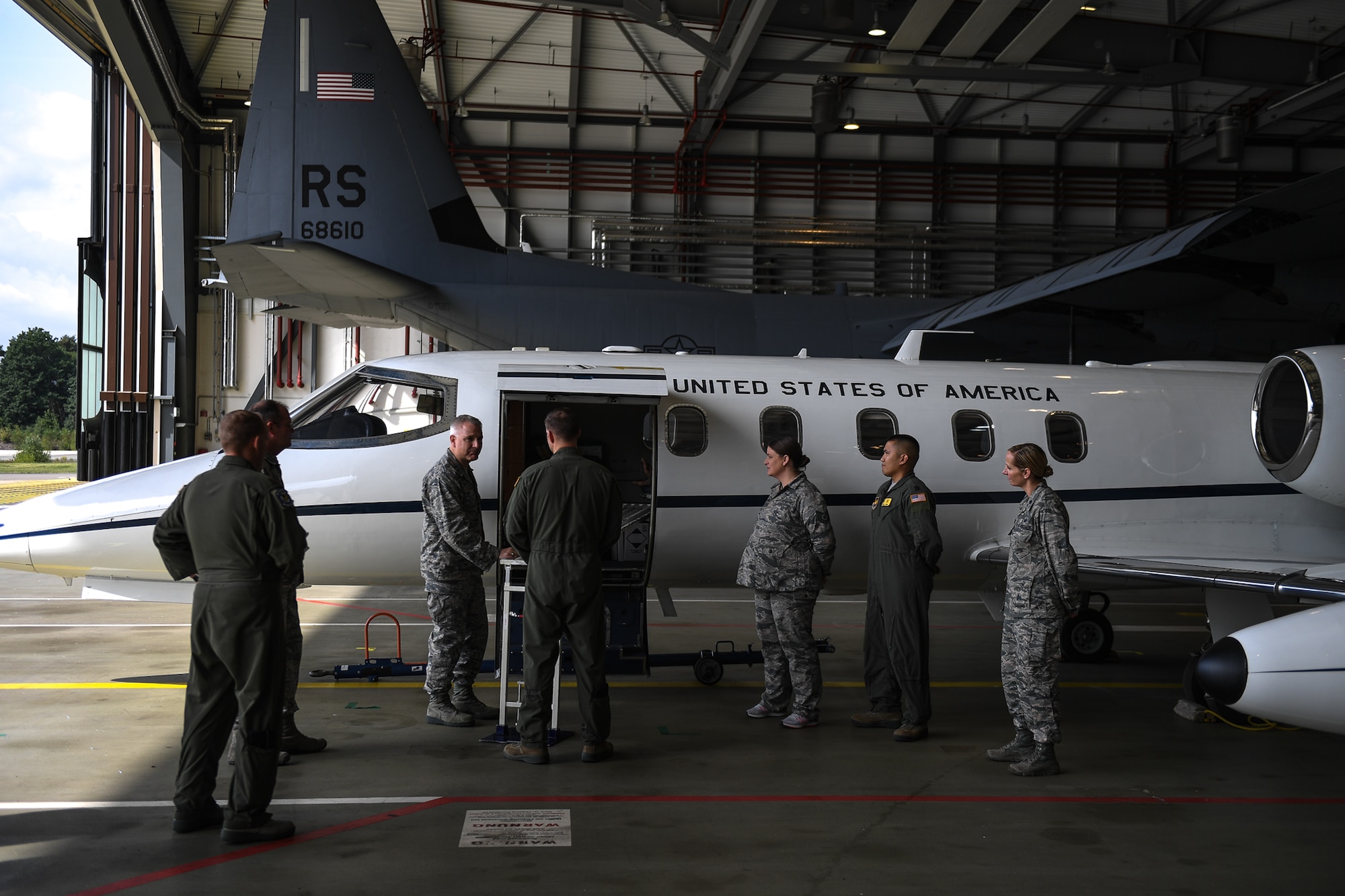 U.S. Air Force Maj. Gen. Timothy G. Fay, United States Air Forces in Europe and Air Forces Africa deputy commander, speaks with the 86th Medical Squadron Critical Care Air Transportation Team during an 86th Airlift Wing immersion tour in the dual bay on Ramstein Air Base, Germany, Sept. 7, 2017.