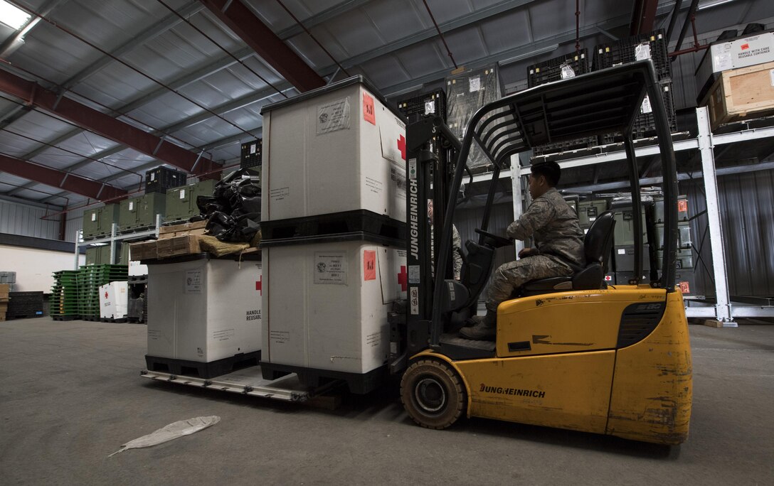 U.S. Air Force Airman 1st Class Alexa Fagaragan, 86th Medical Support Squadron war reserve material technician, drives a forklift to move pallets of medical supplies on Ramstein Air Base, Germany, Sept. 7, 2017. The 86th MDSS war reserve material is in charge of $30 million worth of medical supplies and equipment. (U.S. Air Force photo by Senior Airman Tryphena Mayhugh)