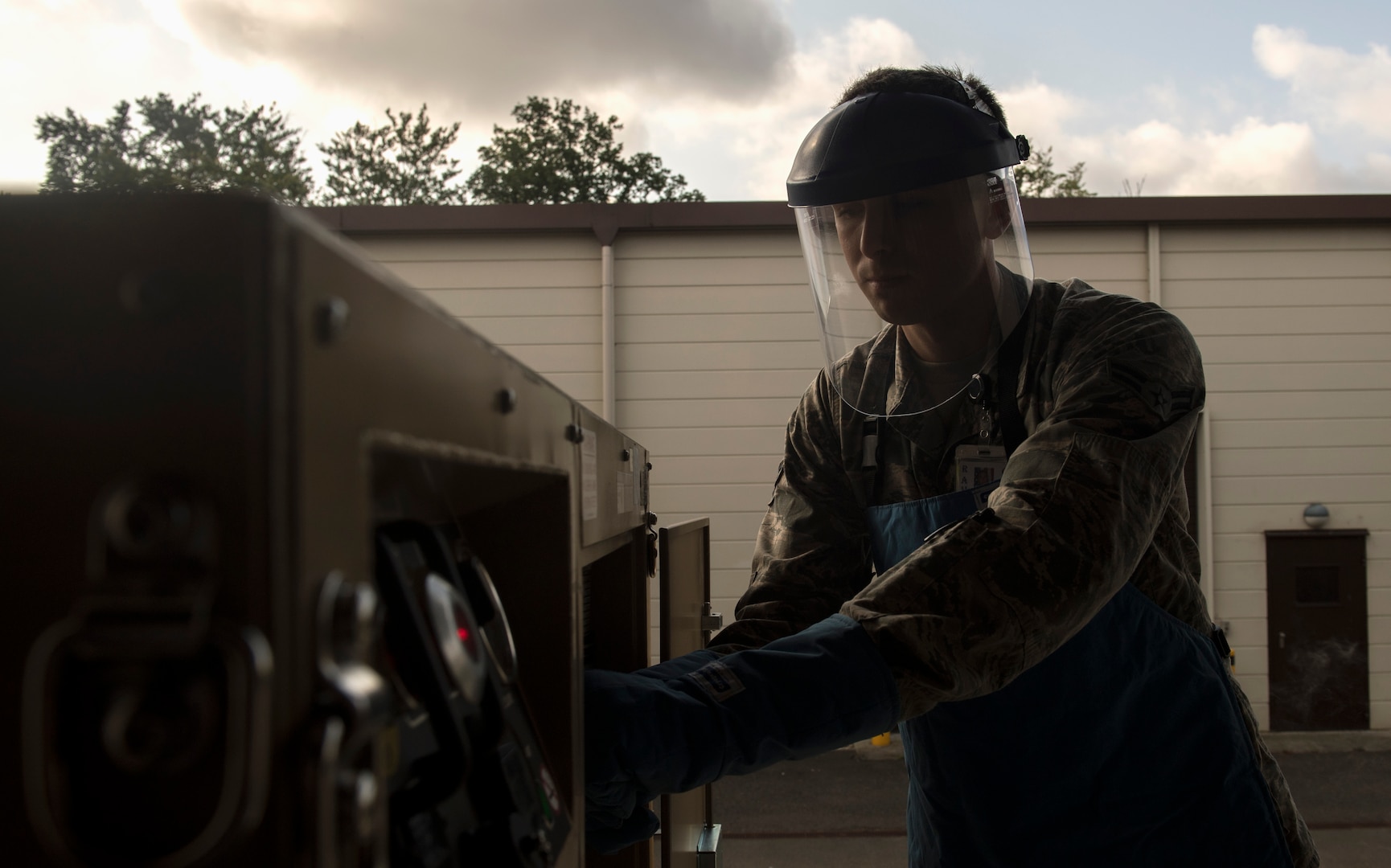 U.S. Air Force Airman 1st Class Ryan Thomas, 86th Medical Support Squadron biomedical equipment technician, adjusts the settings on an oxygen generator and liquefier on Ramstein Air Base, Germany, Sept. 7, 2017. The OGL is used to fill medical equipment with liquid oxygen and was recently purchased by the 86th MDSS, along with a nitrogen generator, to cut their turnaround time for filling the equipment from three weeks to two or three days and to save the Air Force approximately $7,000 a month. (U.S. Air Force photo by Senior Airman Tryphena Mayhugh)