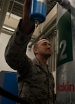 U.S. Air Force Staff Sgt. Jason Bishop, 86th Medical Support Squadron noncommissioned officer in charge of clinical maintenance, checks the settings for a nitrogen generator on Ramstein Air Base, Germany, Sept. 7, 2017. The 86th MDSS recently purchased the generator to replace using tanks that required refilling and two Airmen to safely operate, saving the Air Force man hours and approximately $7,000 a month.  (U.S. Air Force photo by Senior Airman Tryphena Mayhugh)