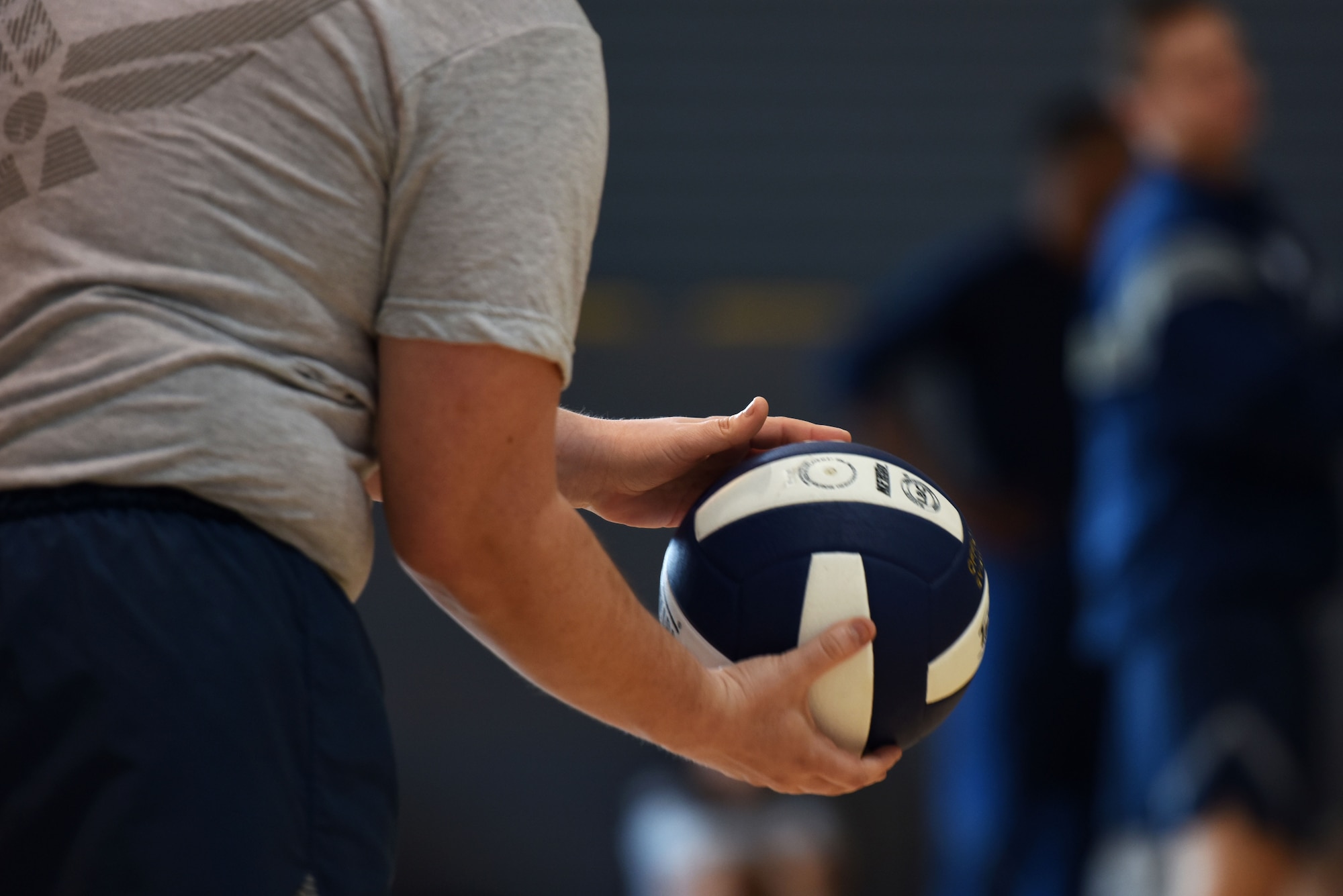 U.S. Air Force Staff Sgt. Jonathan Bass; 86th Airlift Wing; photojournalist; prepares to serve the ball during a volleyball game at the Commanders Cup; on Ramstein Air Base; Germany; Sept. 6; 2017. The events at the Commanders Cup are used to teach airman of all ranks to be resilient. (U.S. Air Force photo by Airman 1st Class Milton Hamilton)