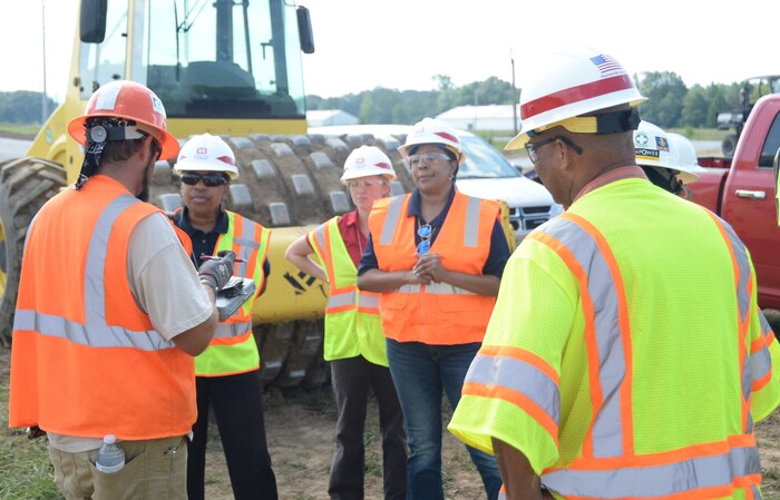 Employees from the U.S. Army Engineering and Support Center, Huntsville  receive a site briefing by a SunPower Corporation contractor  before visiting a solar aray construction site on Redstone Arsenal. The project is the first Power Purchase Agreement Program project solicited through the renewable and alternative energy Multiple Award Task Order Contract awarded by Huntsville Center in 2013. It will involve a 27-year Renewable Energy Services Agreement and lease with SunPower Corporation.