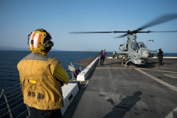 U.S. 5TH FLEET AREA OF OPERATIONS (Sept. 06, 2017) Sailors assigned to the air department aboard the amphibious transport dock ship USS San Diego (LPD 22) prepare to refuel an AH-1Z Viper (USMC), assigned to Marine Medium Tiltrotor Squadron 161 (reinforced) on the ship’s flight deck during Alligator Dagger exercise. San Diego is part of the America Amphibious Ready Group and, with the embarked 15th Marine Expeditionary Unit, is in to the U.S. 5th Fleet area of operations in support of maritime security operations to reassure allies and partners, and preserve the freedom of navigation and the free flow of commerce in the region.  (U.S. Navy photo by Mass Communication Specialist 3rd Class Justin A. Schoenberger/Released)