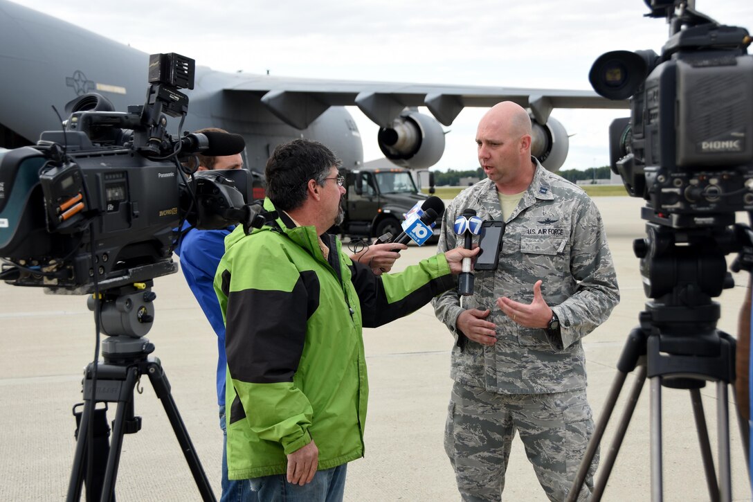 Capt. Craig Conner, 269 Combat Communications Squadron Detachment Commander speaks with the media on the ramp at Wright Patterson Air Force Base, Ohio about their deployment to St. Croix, U.S. Virgin Island in support of the Hurricane Irma relief effort Sept. 7.