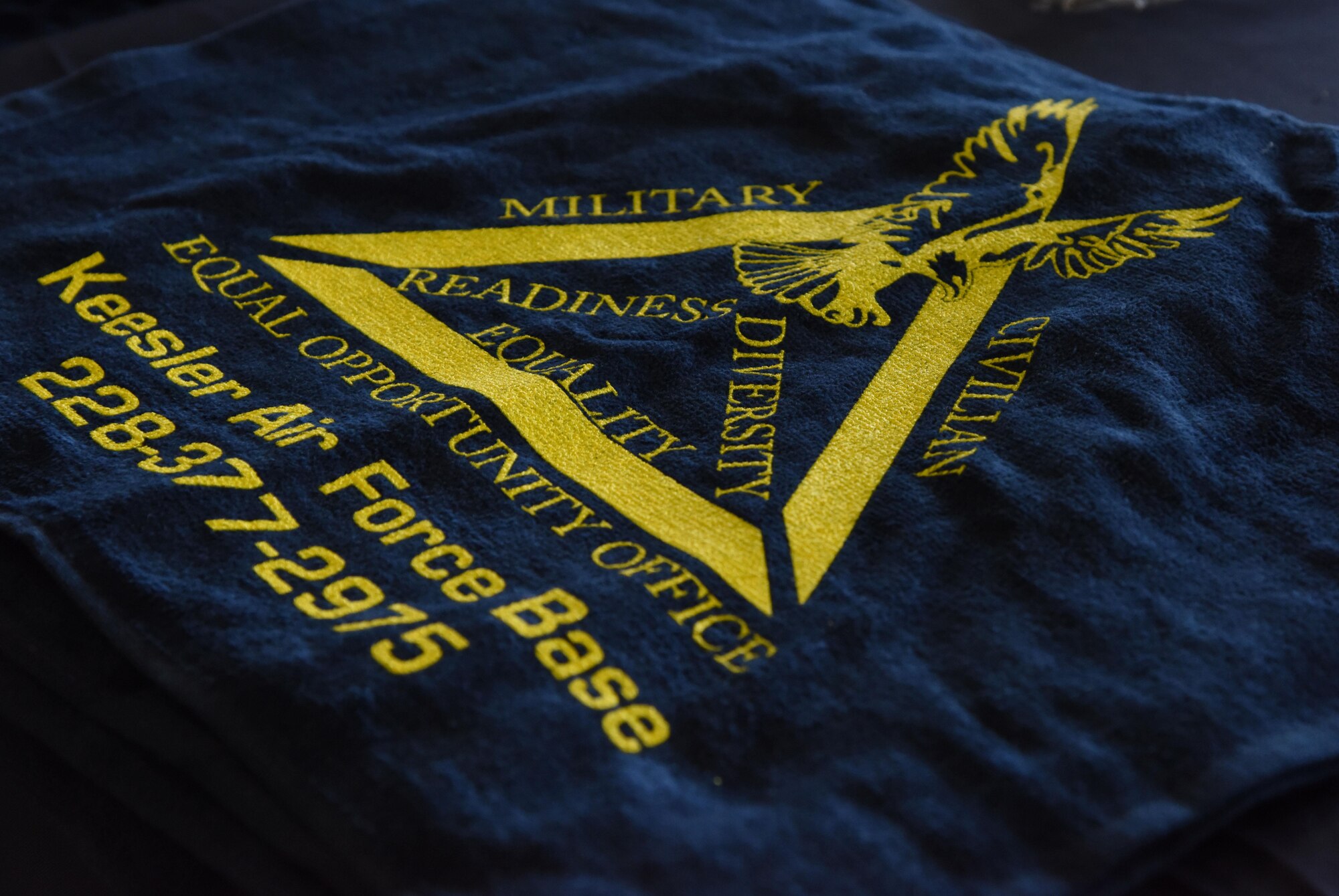 An Equal Opportunity Office towel sits on display during Diversity Day at the Bay Breeze Event Center Sept. 6, 2017, on Keesler Air Force Base, Miss. The cultural celebration included food sampling and information booths about countries around the world and other special emphasis groups. (U.S. Air Force photo by Kemberly Groue)