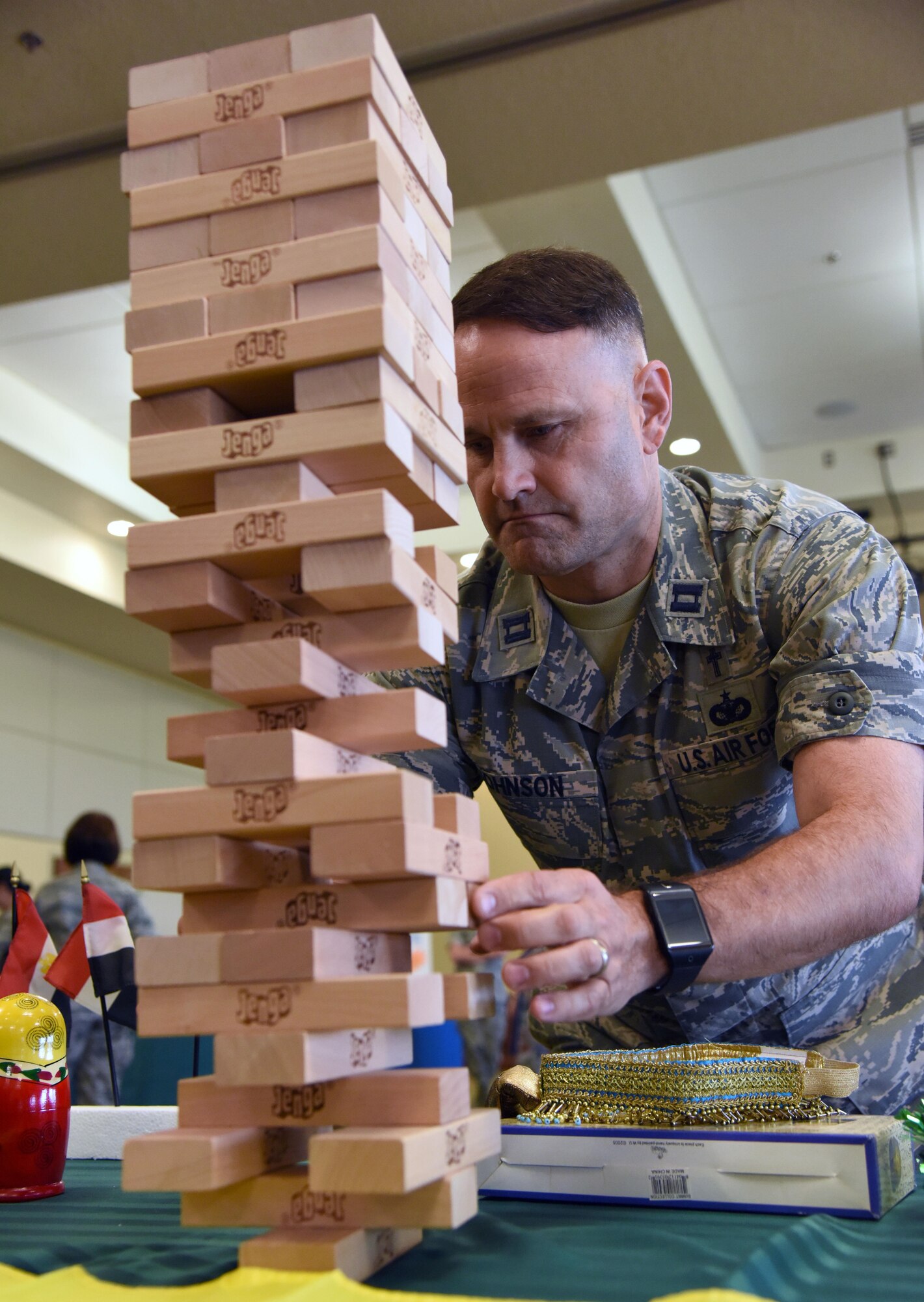 Chaplain (Capt.) Michael Johnson, 81st Training Wing chaplain, participates in a game during Diversity Day at the Bay Breeze Event Center Sept. 6, 2017, on Keesler Air Force Base, Miss. The cultural celebration included food sampling and information booths about countries around the world and other special emphasis groups. (U.S. Air Force photo by Kemberly Groue)