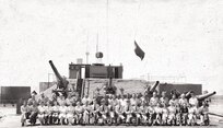 IMAGE: 4 Aug 1945
ORDNANCE HISTORY: Plate Fuze Battery Personnel, Front Row L-R: E.B. Lewis, W. Cleek, C. Shook,
M. Rose, M. Baird, B. Wegner, N. Atkins, N. Wall, J. Owens, Ens. F.M. Perkins, USNR; Lt. (jg) V.
Philipchuk, USNR, Comdr. GT. Atkins, USN, Comdr. G. K. Williams, USN, Lt. P.A. Krentel, USNR; Lt
(jg) J.H. Roseboom, USNR, Grayson Elliott, H. Legg, E. Pulliam, D. THornhill, A. Wesner, E. Armstrong,
N. Sperance, D. Stone, L. Morgan, F. Staples. Standing L-R: W. Brandy, G. McKenny, J. Daffan, H
Green, J. White, M. Henderson, W. Marshall, J. Jenkins, G. Clarke, A. Brent, T. Newton, I. Davis, G.
Alford, T. Stewart, J. Nash, J. Parker, L. Newton, H. Crowley, R. Rice, E. Brown, J. Bellomy, T. Reeves,
Following personnel not in picture: Lt. L.E. Sizemore, USNR; W. Rose, O. Henderson, C. Dodson, A.
Smoot, H. Ratcliffe, H. Trott, C. Gallahan, N. Naves, P. Luck, J. Coe, W. Robinson