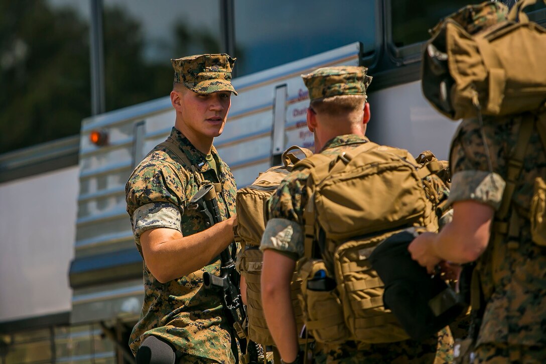 U.S. Marines with the 26th Marine Expeditionary Unit (MEU), enter a bus during a departure to embark aboard the amphibious assault ship USS Iwo Jima at Marine Corps Base Camp Lejeune, N.C., Sept. 7, 2017. Approximately 300 Marines with the 26th MEU embarked on the USS Iwo Jima in preparation to ensure the unit is ready to respond to any requests to bolster Northern Command’s support of FEMA’s assistance to federal, state and local authorities’ ongoing relief efforts in the aftermath of Hurricane Irma. (U.S. Marine Corps photo by Staff Sgt. Dengrier M. Baez)