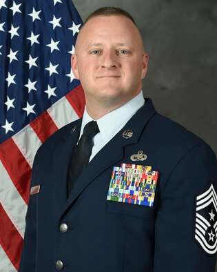 Official photograph of Chief Master Sgt. Joshua Swanger