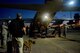 Evacuees retrieve their luggage from the flightline at Dobbins Air Reserve Base, Ga. Sept. 6, 2017. The aircraft carried civilian and contract Department of Defense personnel who were evacuated from the Caribbean in anticipation of Hurricane Irma. (U.S. Air Force photo/Don Peek)