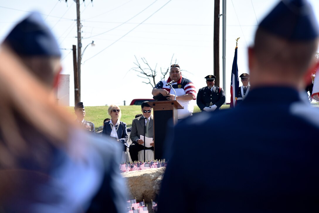 Rosendo Velez, retired New York emergency medical responder, speaks at the 9/11 Memorial Rededication near the San Angelo Museum of Fine Arts in San Angelo, Texas, Sept. 8, 2017. After vandals stole the original piece of metal from the monument, Velez dedicated new steel from the Twin Towers. (U.S. Air Force photo by Staff Sgt. Joshua Edwards/Released)
