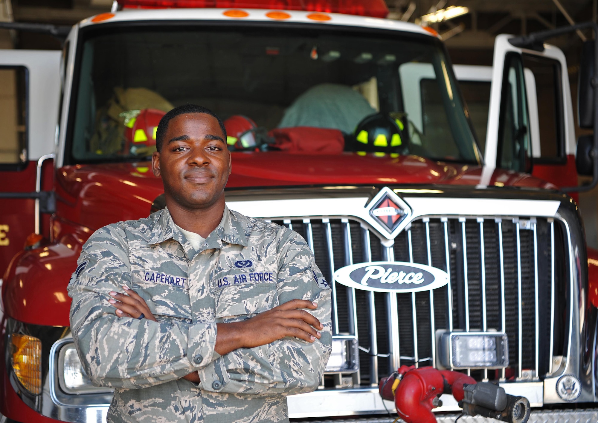 Airman 1st Class Christian Capehart, 9th Civil Engineer Squadron firefighter, poses for a photo.