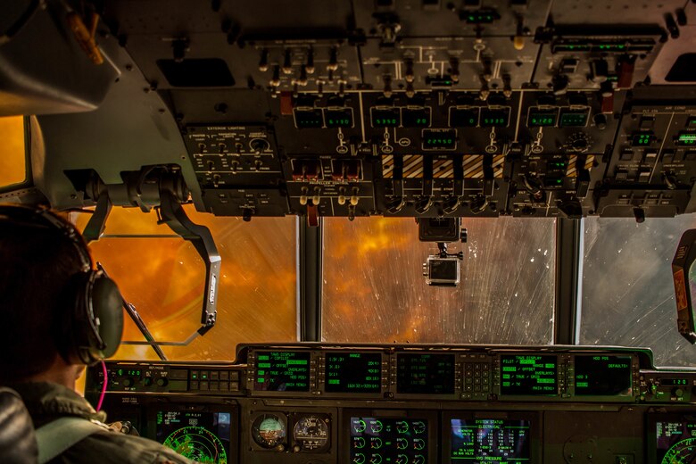 A C-130J Hercules, equipped with the Modular Airborne Fire Fighting System (MAFFS), from the Air National Guard’s 146th Airlift Wing, follows a U.S. Forest Service lead plane under a large column of smoke preparing to drop retardant on the Pier Fire southeast of Fresno, California, August 29, 2017. Air National Guard and Air Force Reserves have been assisting U.S. Forest Service wildfire suppression efforts out of Fresno Air Tanker Base since August 10, 2017. Together they have accomplished more than 200 drops and 530,000 gallons of retardant this season. (U.S. Air National Guard photo by Tech. Sgt. Jeff Allen)